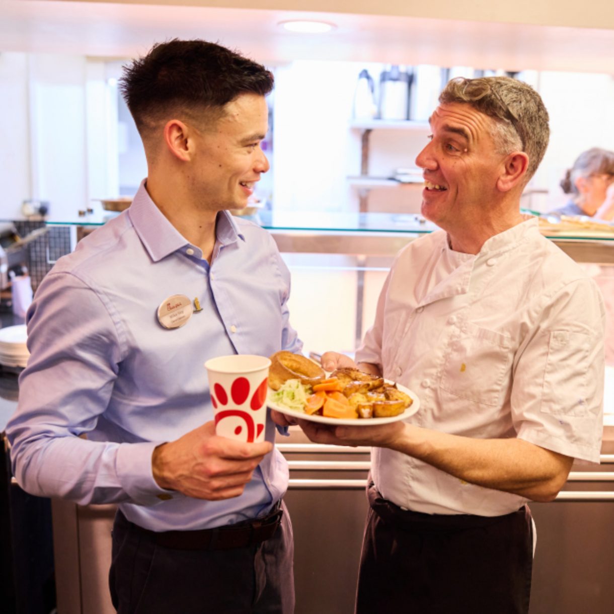 Chick-fil-A Leeds team partnering with St George’s Crypt to donate surplus food through the Shared Table® programme, supporting local homeless and vulnerable communities.