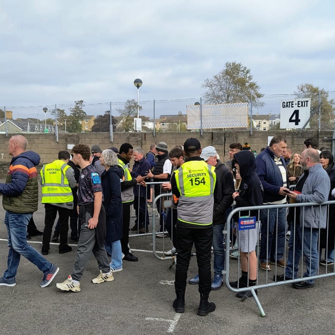 security guards at an event managing ques