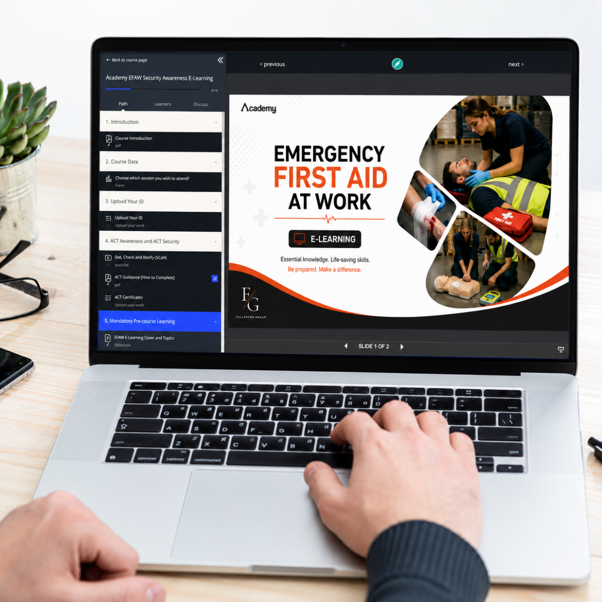 Person completing an Emergency First Aid at Work e-learning course on the Academy Training online learning platform.