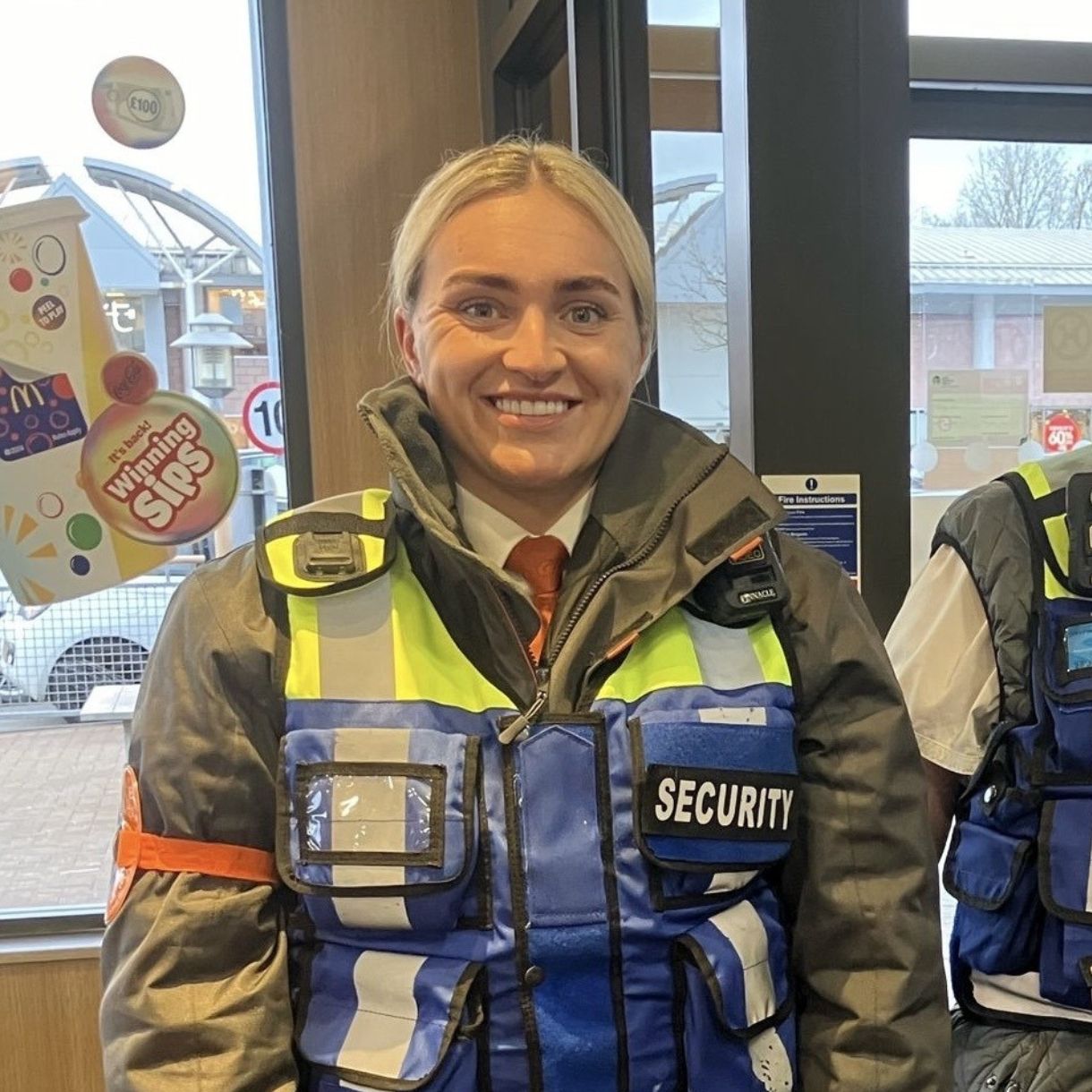 Female security officer representing learners completing the Door Supervisor Refresher Course through Professional Security Academy.